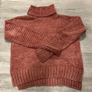 soft pink sweater so warm no imperfections and looks so cute on!